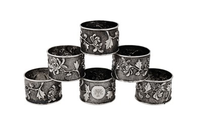 Lot 408 - A set of six early 20th century Chinese Export unmarked silver napkin rings, Shanghai circa 1930