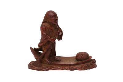 Lot 323 - A CHINESE BAMBOO CARVING OF A SAGE ON A RAFT