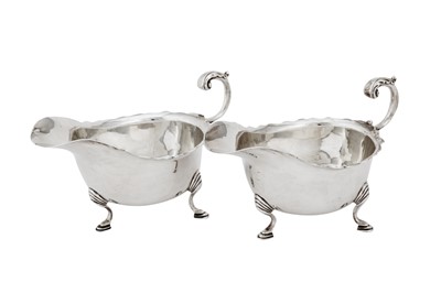 Lot 563 - A pair of Elizabeth II sterling silver sauceboats, Birmingham 1968 by J. B. Chatterley and Sons