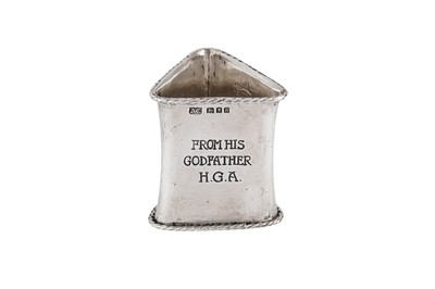 Lot 537 - A George V ‘Arts and Crafts’ sterling silver napkin ring, London 1919 by Alwyn Carr