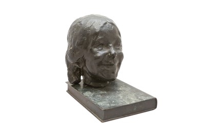 Lot 857 - A BRONZE HEAD OF A SMILING YOUNG GIRL