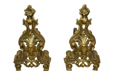 Lot 862 - A PAIR OF GILT BRASS ROCOCO STYLE ANDIRONS