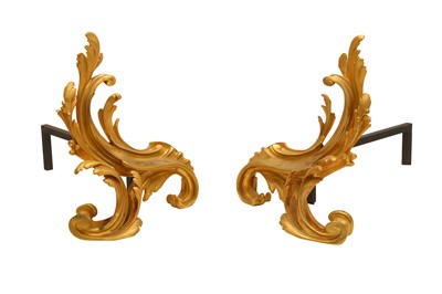 Lot 639 - A PAIR OF ROCOCO STYLE ORMOLU FIRE DOGS