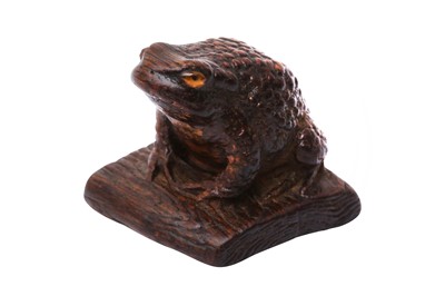 Lot 611 - A JAPANESE WOOD NETSUKE OF A TOAD