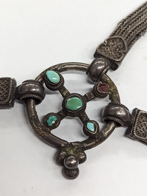 Lot 366 - A COLLECTION OF TIBETAN JEWELLERY AND AMULETS