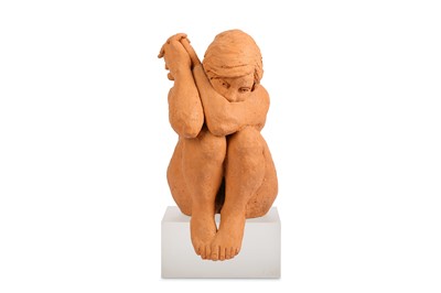 Lot 647 - A TERRACOTTA FIGURE IN THE FORM OF A SEATED GIRL