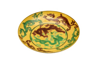 Lot 884 - A CHINESE IMPERIAL YELLOW-GROUND 'DRAGON' SAUCER DISH