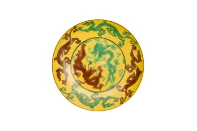Lot 884 - A CHINESE IMPERIAL YELLOW-GROUND 'DRAGON' SAUCER DISH