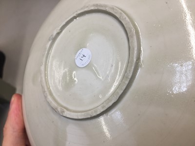 Lot 14 - A CHINESE DING WARE 'DRAGON' BOWL