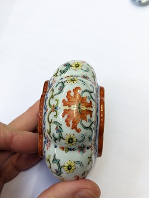 Lot 135 - A CHINESE FAMILLE-ROSE LOBED WATER POT AND COVER
