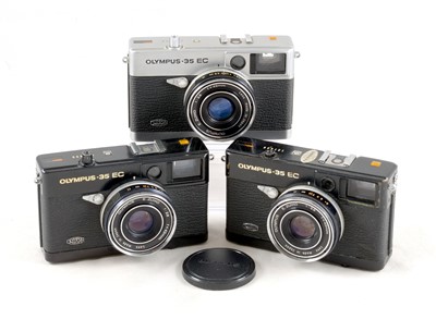 Lot 42 - Two Black & a Chrome Olympus 35EC Compact Film Cameras.