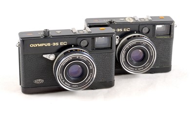 Lot 42 - Two Black & a Chrome Olympus 35EC Compact Film Cameras.