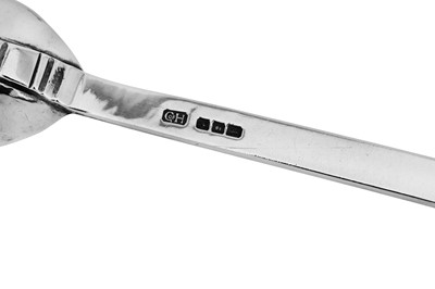 Lot 218 - A George VI ‘Arts and Crafts’ sterling silver preserve spoon, London 1945 by the Guild of Handicraft