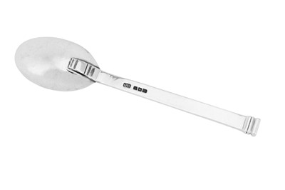 Lot 218 - A George VI ‘Arts and Crafts’ sterling silver preserve spoon, London 1945 by the Guild of Handicraft