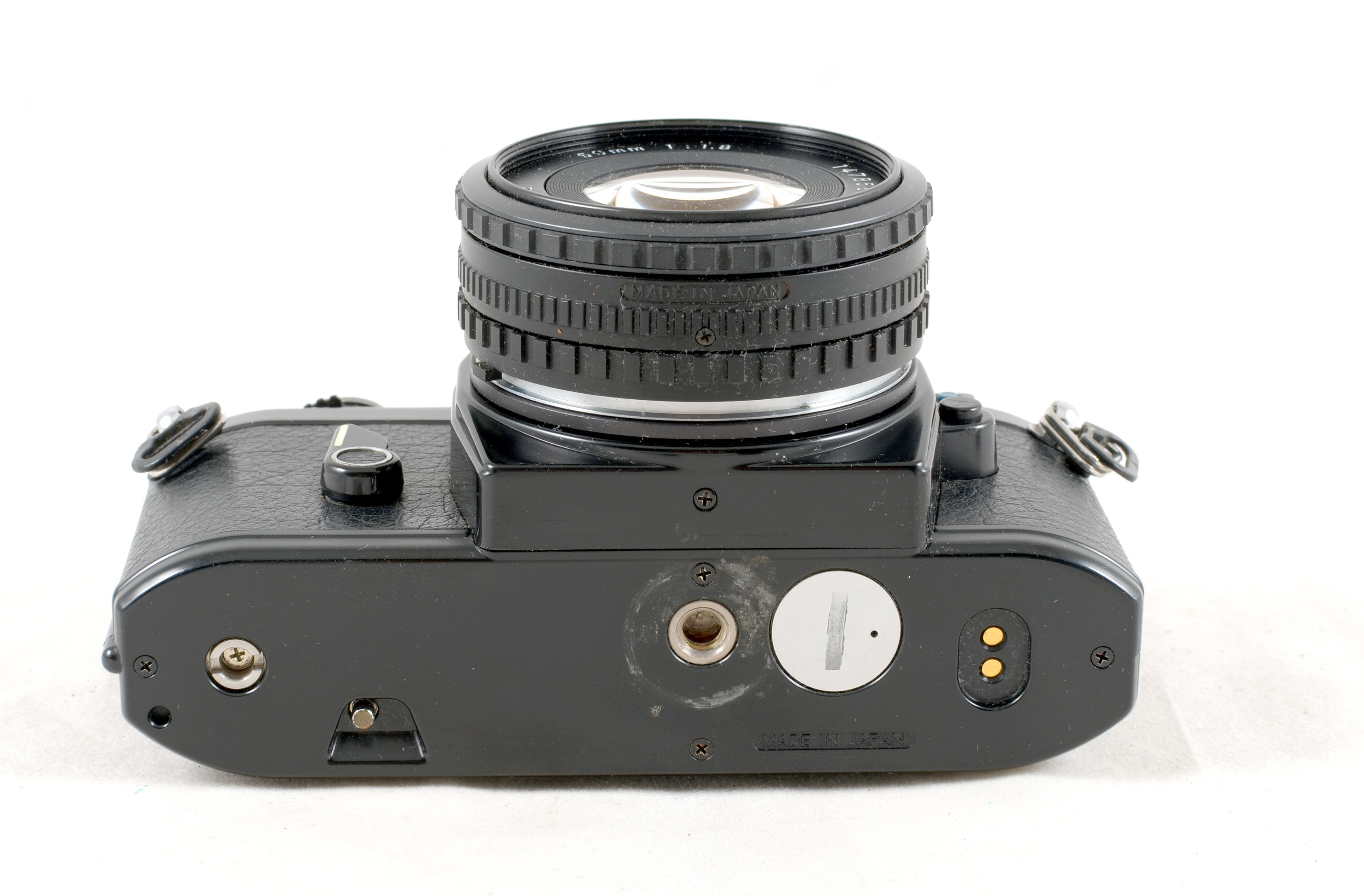 Lot 36 A Nikon EM 35mm Film SLR with 2 Nikkor Lenses.