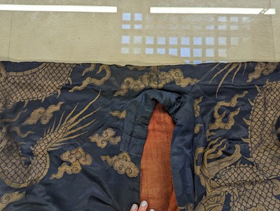 Lot 356 - A CHINESE BLUE-GROUND 'DRAGON' SILK ROBE