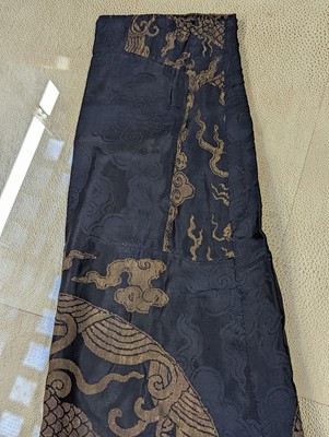 Lot 356 - A CHINESE BLUE-GROUND 'DRAGON' SILK ROBE