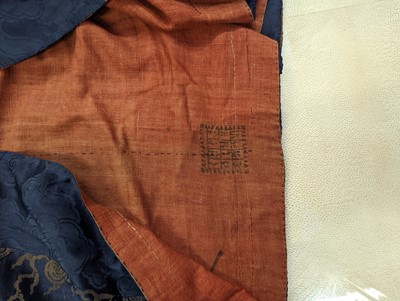 Lot 356 - A CHINESE BLUE-GROUND 'DRAGON' SILK ROBE