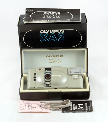 Lot 56 - A Boxed "Urban White" Coloured Olympus XA2 Compact Camera.