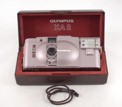 Lot 61 - A Rare Olympus XA2 Camera in Commemorative Pink (for 70 years of Olympus).