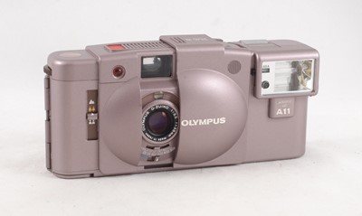 Lot 61 - A Rare Olympus XA2 Camera in Commemorative Pink (for 70 years of Olympus).