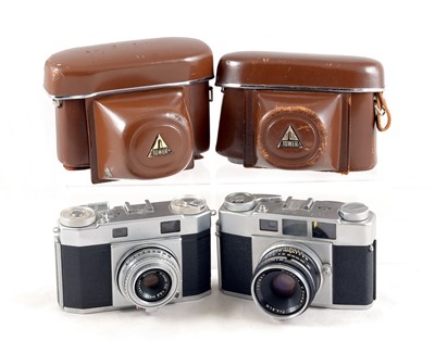 Lot 91 - A Rare Pair of Tower Branded Olympus 35 Rangefinder Cameras.