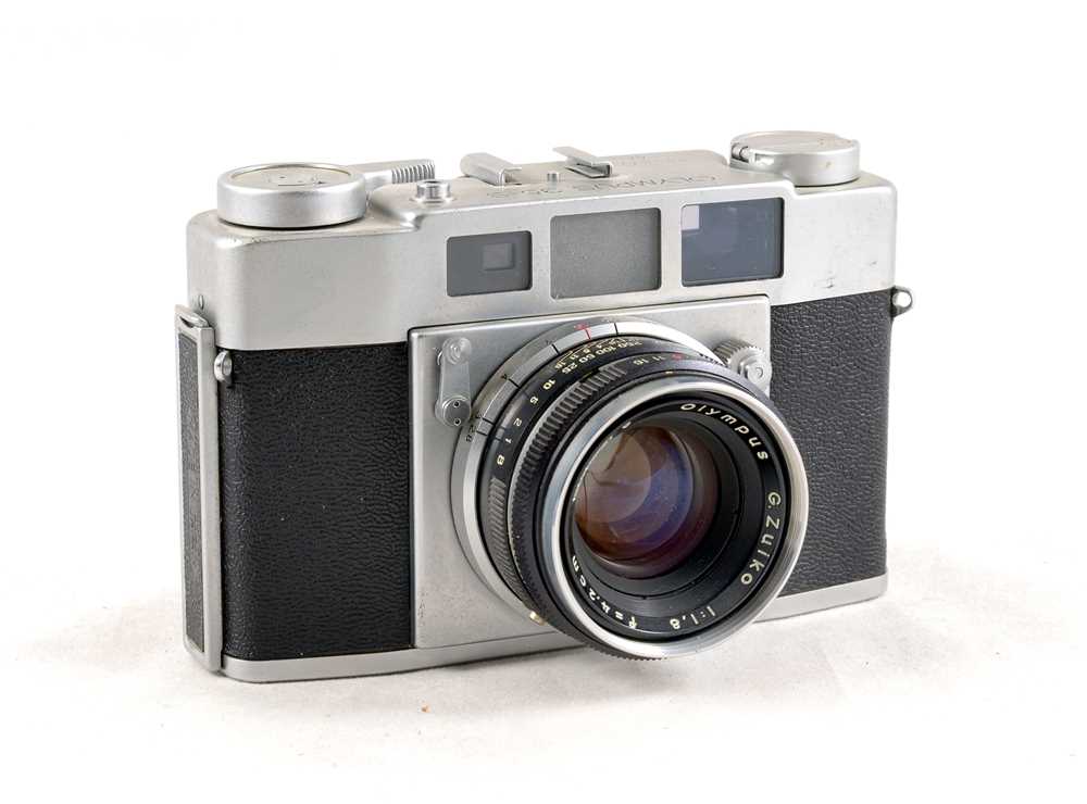 Lot 92 A Group of Three Olympus 35S Rangefinder
