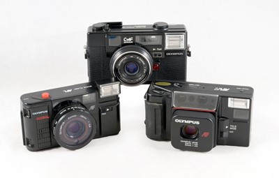 Lot 66 - Three Olympus Point-and-Shoot Compact Cameras.