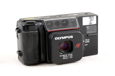 Lot 66 - Three Olympus Point-and-Shoot Compact Cameras.
