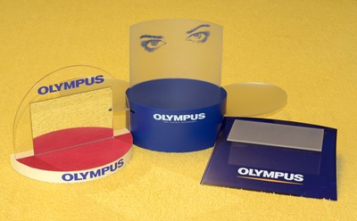 Lot 108 - Group of Olympus Point-of-Sale Advertising Display Stands.