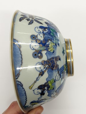 Lot 550 - A CHINESE BLUE AND WHITE 'BOYS' BOWL