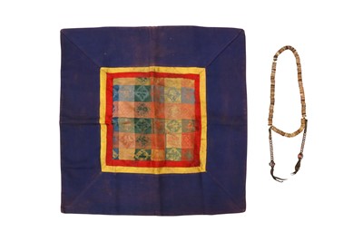 Lot 562 - λ A TIBETAN BONE MALA AND AN ALTAR CLOTH