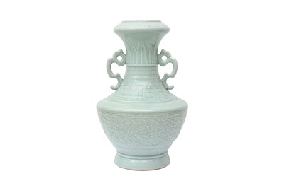 Lot 543 - A CHINESE CELADON-GLAZED 'PEONIES' VASE