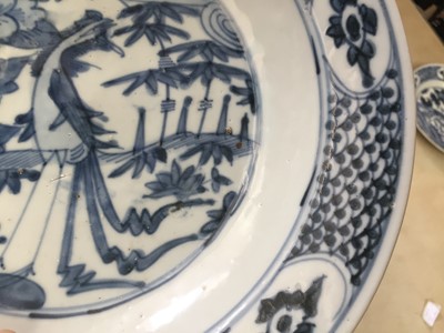 Lot 49 - TWO CHINESE BLUE AND WHITE SWATOW 'PHOENIX' DISHES