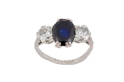 Lot 46 - A sapphire and diamond three-stone ring
