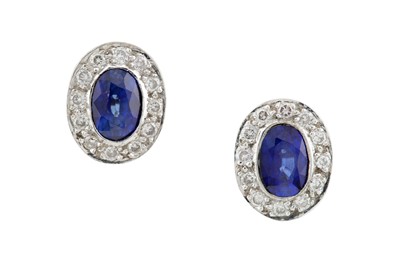 Lot 48 - A pair of sapphire and diamond earstuds