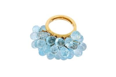 Lot 71 - From the Private Collection of the late Jackie Collins | A blue topaz dress ring