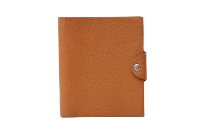 Lot 527 - Hermes Gold Togo Ulysse Neo Notebook Cover PM