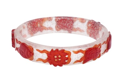 Lot 365 - A CHINESE RED OVERLAY GLASS 'BAJIXIANG' BRACELET