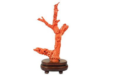 Lot 325 - λ A CHINESE CORAL CARVING OF AN IMMORTAL MAIDEN
