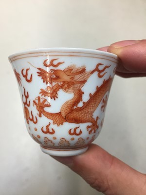 Lot 72 - A PAIR OF CHINESE IRON-RED 'DRAGON' CUPS