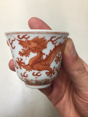 Lot 72 - A PAIR OF CHINESE IRON-RED 'DRAGON' CUPS