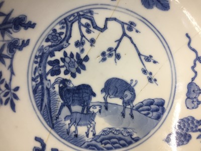 Lot 74 - A CHINESE IRON-RED AND UNDERGLAZE-BLUE 'THREE RAMS' BOWL