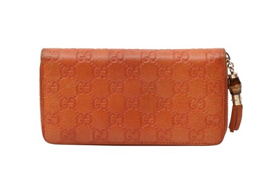 Lot 400 - Gucci Orange GG Zip Around Long Wallet