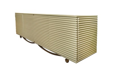 Lot 729 - A CONTEMPORARY WOODEN CORRUGATED EFFECT SIDE BOARD