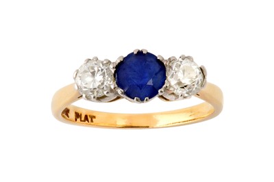 Lot 50 - A sapphire and diamond three-stone ring