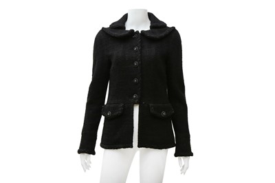 Lot 853 - Chanel Black Wool Boucle Peplum Jacket - Size 38