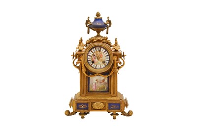 Lot 629 - A FRENCH SEVRES STYLE GILT METAL AND PORCELAIN MOUNTED MANTEL CLOCK