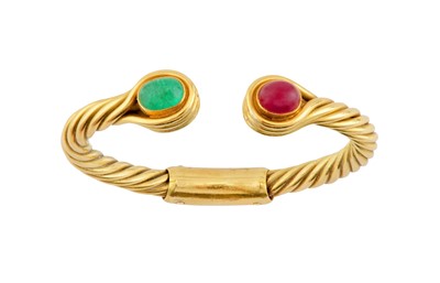 Lot 21 - A ruby and emerald torc bangle