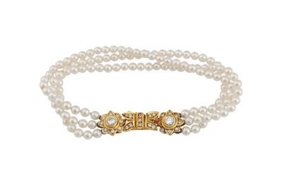 Lot 22 - A cultured pearl and diamond bracelet